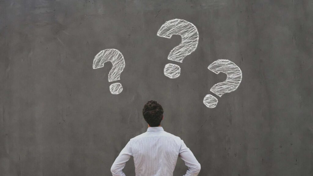 Guy thinking of questions to ask